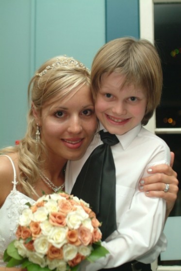 Me with my cousin Yannik (aka ring bearer/mini-groomsman) on my wedding day in 2006