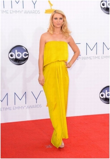 Pregnant and literally glowing in Lanvin, Claire Danes makes us want to go out and buy lots more yellow this season! Just gorgeous!